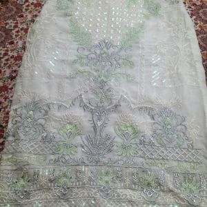 Beautiful Pakistani Suit With Net Frill Dupatta