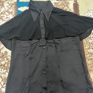 Black sleeveless satin shirt