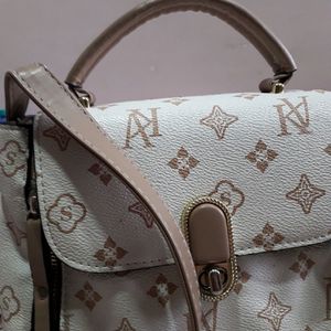 White And Cream Textured Sling Bag