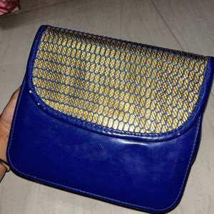 Gold Toned Blue Bag