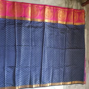 A Pattu Navy Blue nd Pink Coloured Saree.