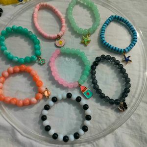 Handmade Bracelets With Glass Beads And Charms