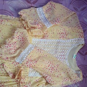 Yellow Kurti With Pink Details And White Chamkas