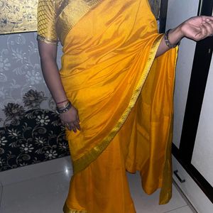 Yellow saree with blouse 1 time used only new sare