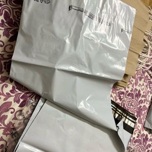 Small Paper Bags And Big Courier Bag