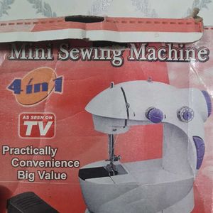 Mini Sewing Machine.