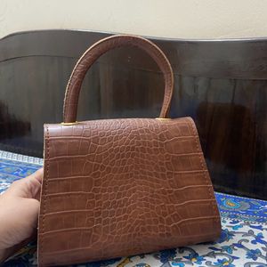 Brown Purse And Sling Bag