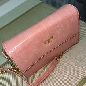 Tory burch clutch first copy