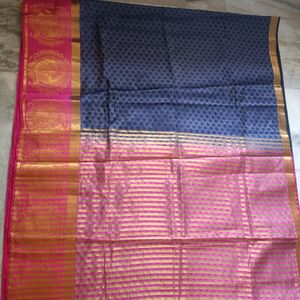 A Pattu Navy Blue nd Pink Coloured Saree.