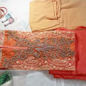 Coral Net And Satin Kurta Pyjama Set With Dupatta