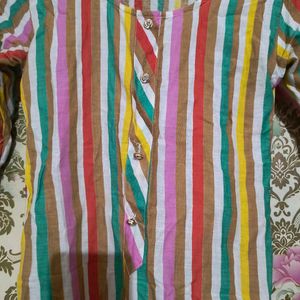 Its a Multicolour Kurti. Looks Beautiful