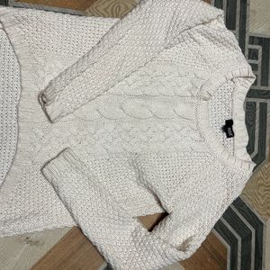 white wool sweater