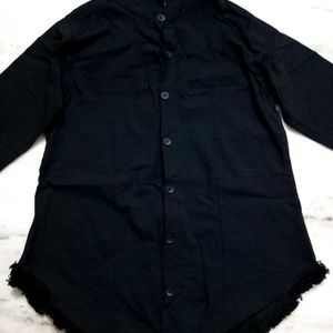 A Black Shirt With Good Or Excellent Quality.