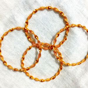 Golden Bangles (4 Pieces)