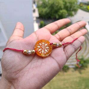 Orange Om Resin Rakhi