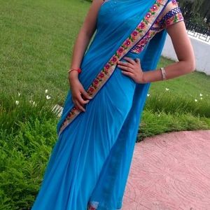 Blue Saree With Colorful Embroidery Blouse