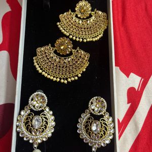 Pair Of Golden And Silver Earrings