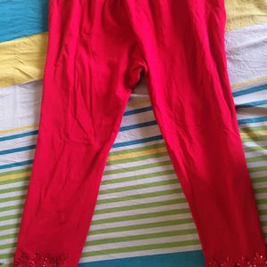 Red Leggings A Little Below Knee Length With Work