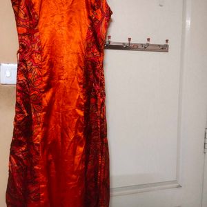 Orange Satin Gown For Women With Light Floral