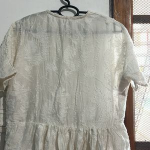 Vintage White Dress with Textured Fabric.