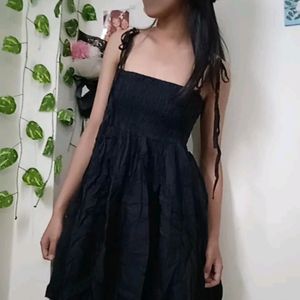 black laced up mini dress