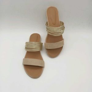 Tan And Gold Flat Sandals.