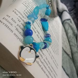 Stylish blue phone charms with a cute penguin🐧🐧