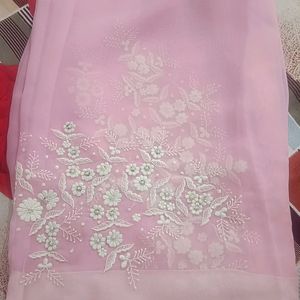 A Pink Saree With Beautiful Design