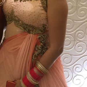 Its A Roka Gown In Peach Colour Very  Good Conditi