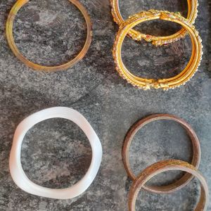 Gold Bangles Pair, And Plastic Bangle