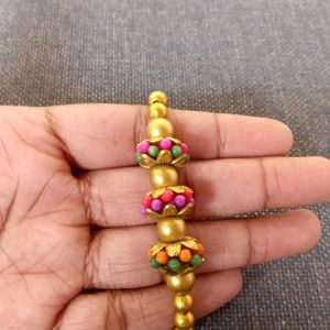 Cute Golden Bracelet With 3 Colourful Flowers