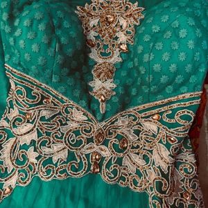 Green Vibrant Heavily Embellished Ethnic Gown