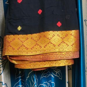 Black Red And Yellow Design Saree With Orange Par