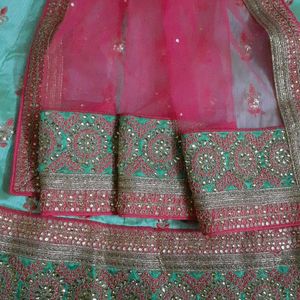 Pista Green Pink Bridal Lehenga Semi Stitched