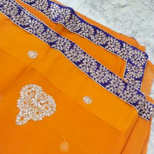 Beautiful saree..small border.1 time used..30min