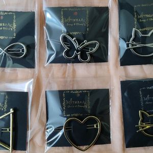 BRAND NEW KOREAN CLIPS. GOLD (1) AND SILVER(1) PINS IN A PACK