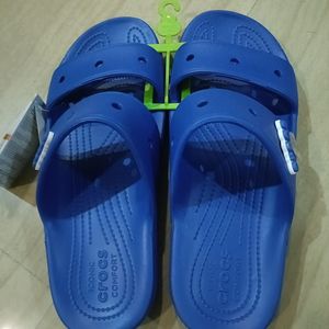 Crocs Classic Blue Sliders.