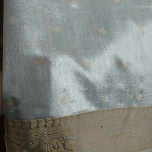 Grey Colour Saree With Golden Border