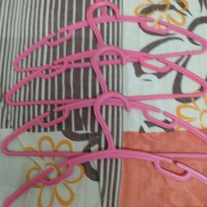 One Dozen Baby Hangers Of Colour Pink Orange & Etc