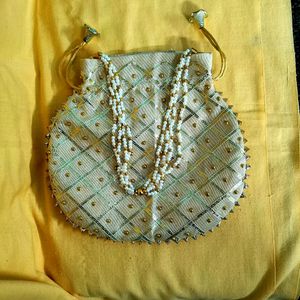 Designer small Creame colour Hand bag( ladies)
