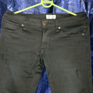 Stretchable Black Branded Jeans. Fits 26-28 Size.