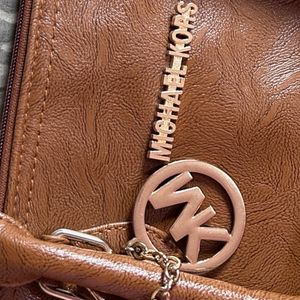 Brown Textured Handbag For Women