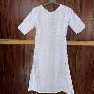 White coloured Stitched with floral Printed kurti.