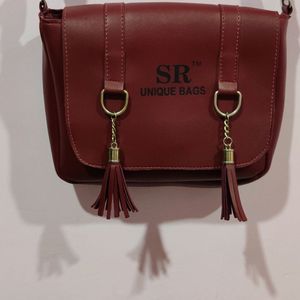 Adjustable sling handbag