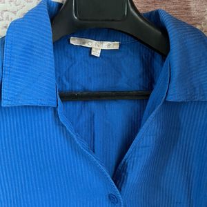 A Blue UNISEX Shirt.