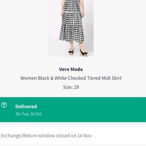 Women Black And white Checked Skirt From Myntra