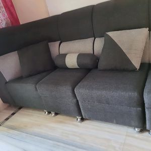 L-Shaped Sofa With 2 Cushions