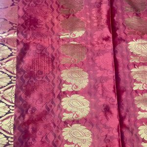 Orange kanchi Pattu Saree With Pink Pallu