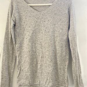 grey top with silver studs