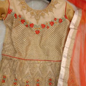 party wear golden and orange gown